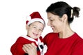 Small kid in Santa Claus clothes with his Ã¢â¬â¹Ã¢â¬â¹grandmother Royalty Free Stock Photo